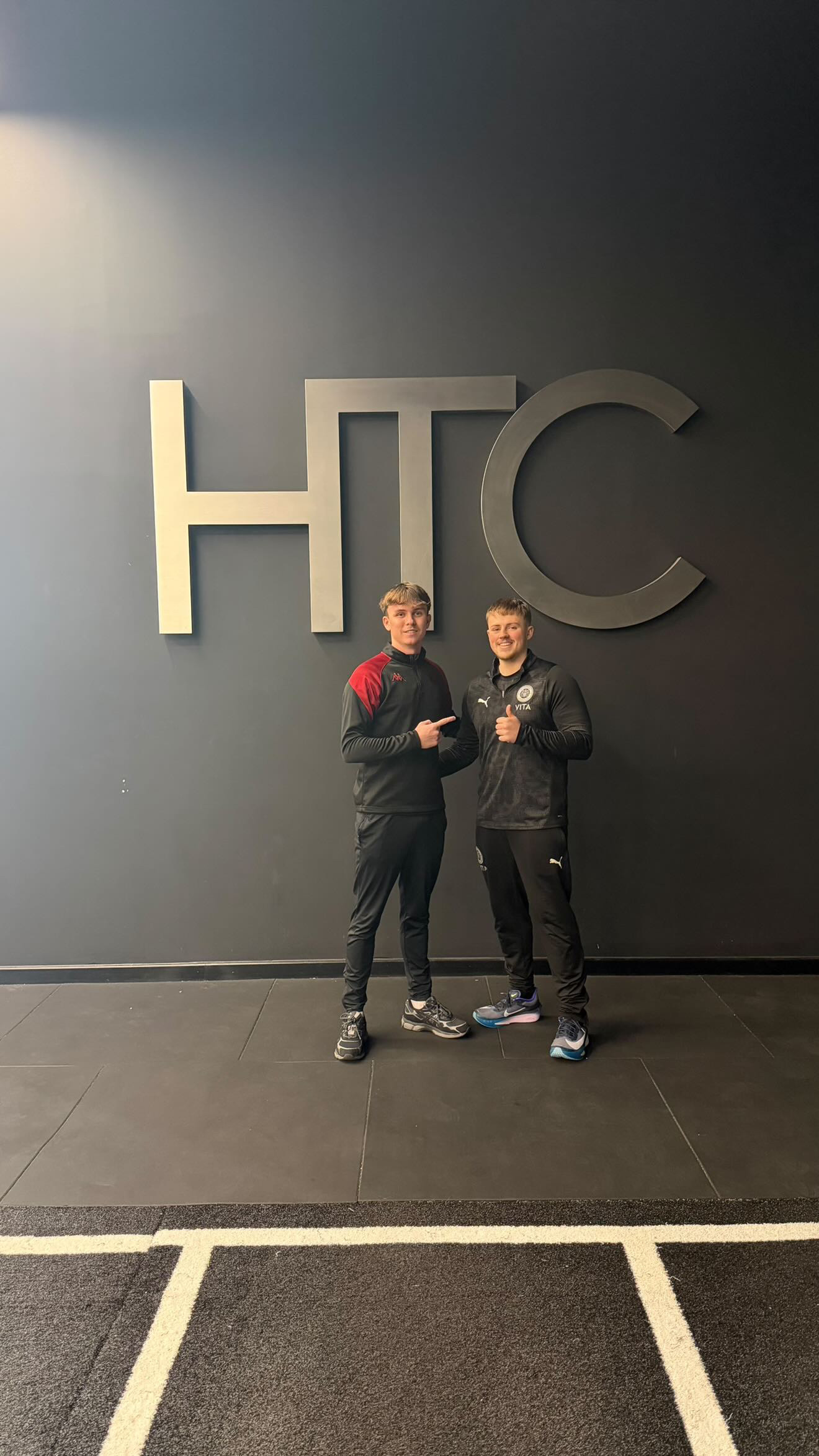 Ethan Conroy with a client in a high-performance training environment